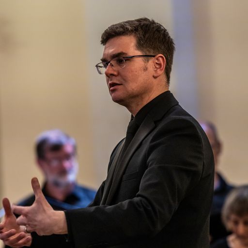 Ben Sawyer conducting a choir